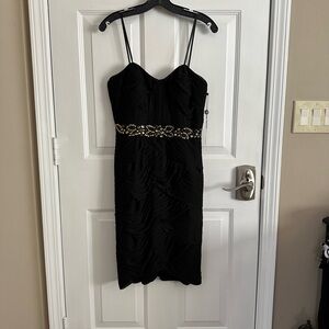 Elegant Black Dress with Gold Accents